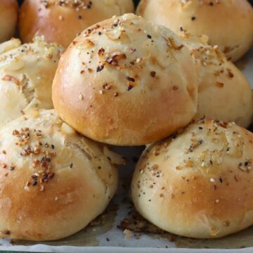 Soft Onion Rolls on a tray.