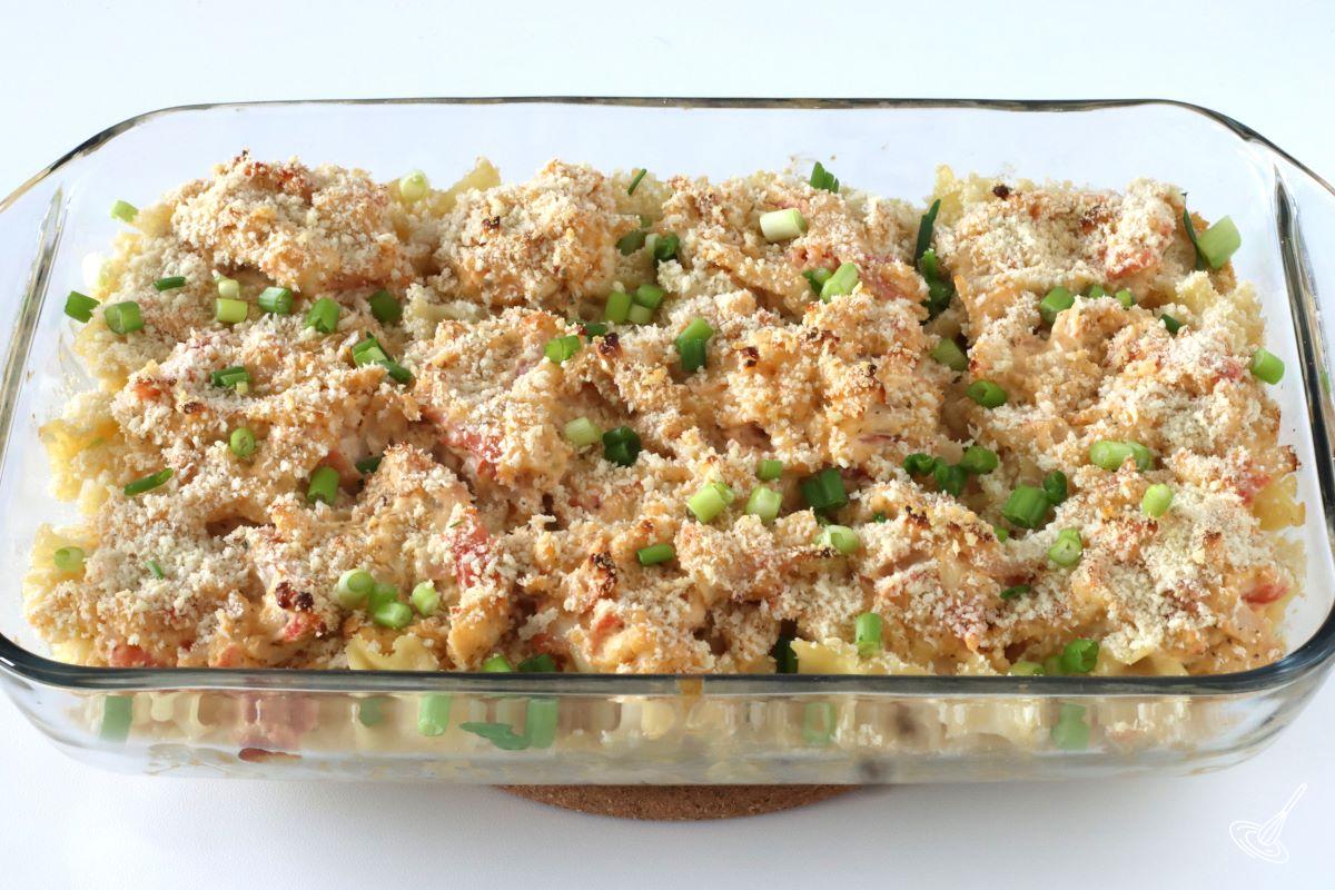 A tray of baked Crab Rangoon Casserole.