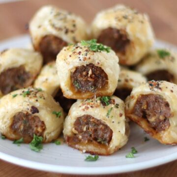 French Onion Sausage Rolls on a plate.