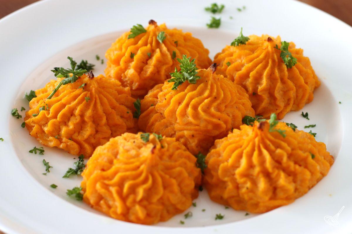 Duchess Sweet Potatoes on a plate.