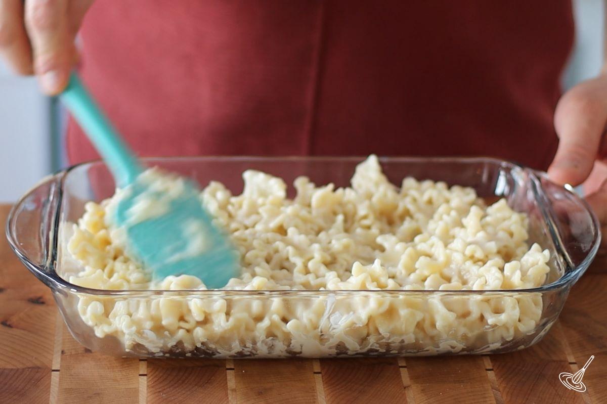 Alfredo pasta in a baking dish.