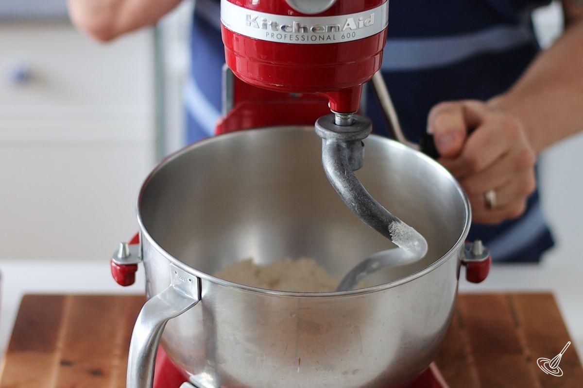 A stand mixer equipped with a dough hook.