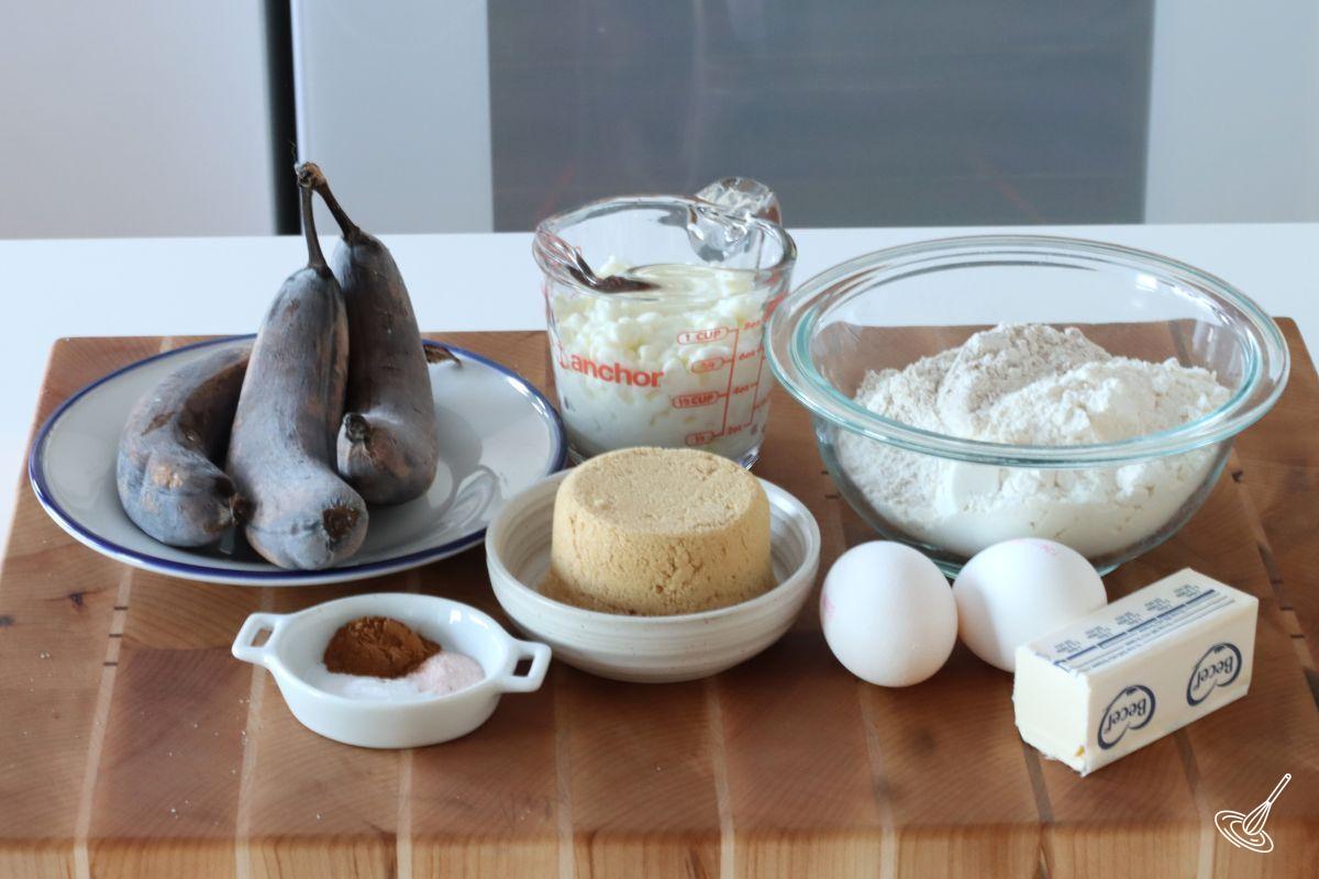 Ingredients to make banana bread including flour, butter, brown sugar, and cottage cheese.