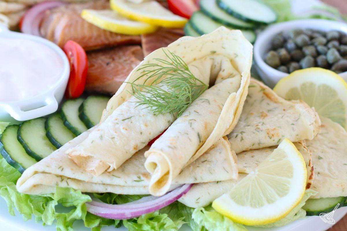 Dill French Crêpes served with smoked salmon and vegetables.