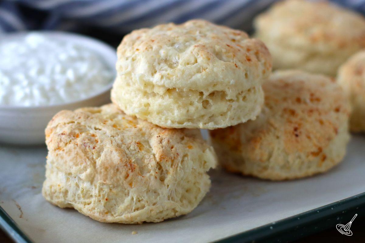 Cottage Cheese Biscuits on a tray with a side dish of cottage cheese. 