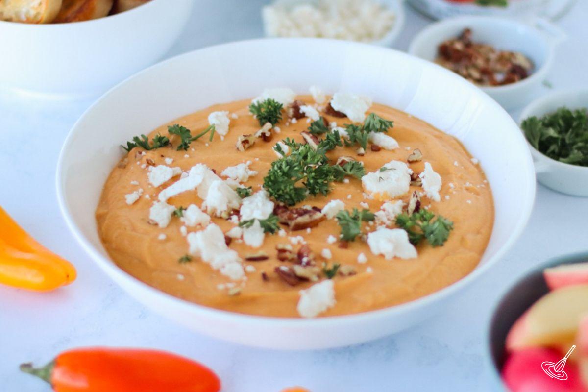 Pumpkin Whipped Feta Dip in a serving bowl. 