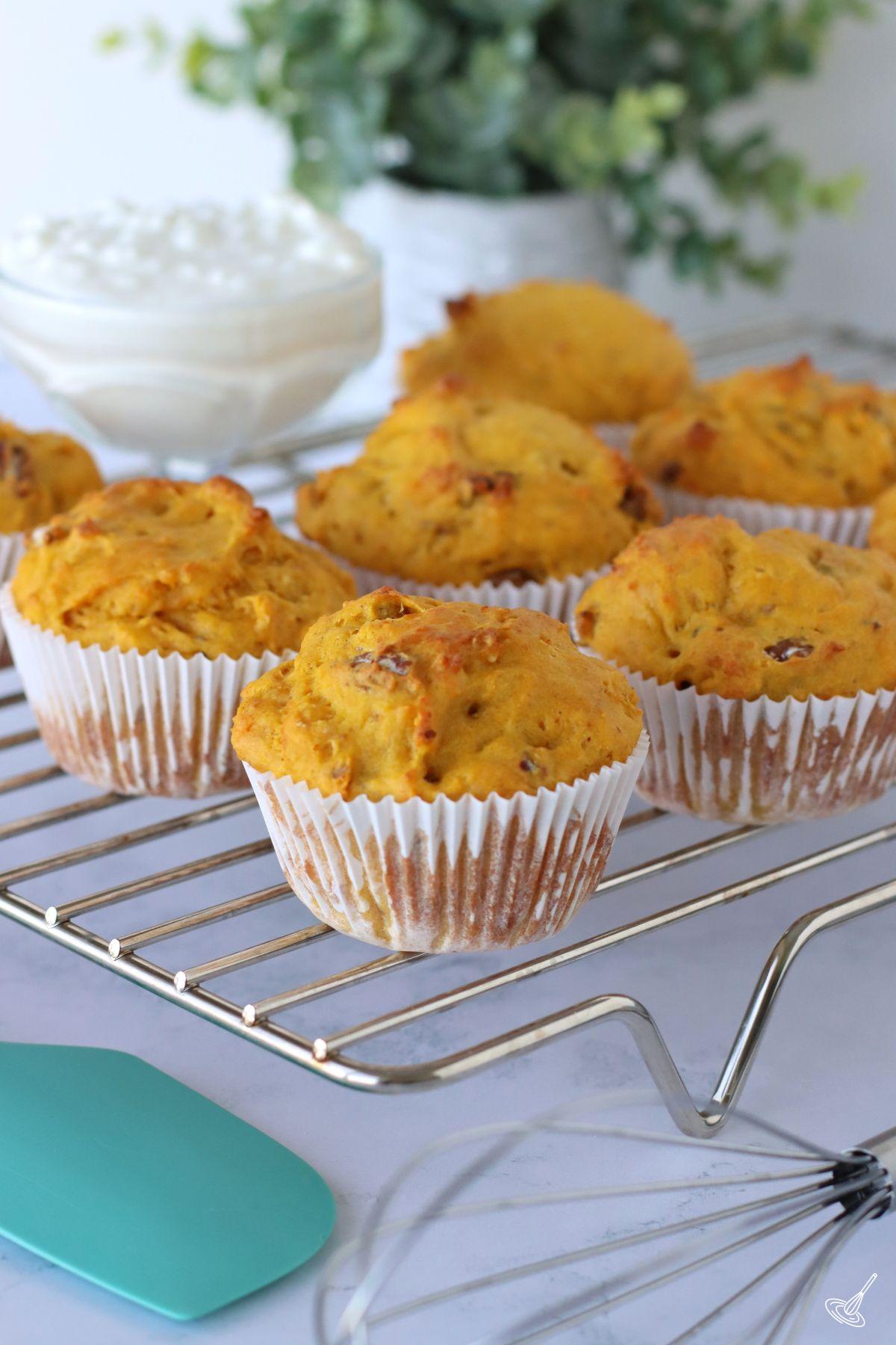 Pumpkin Cottage Cheese Muffins on a cooling rack.