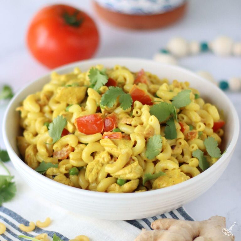 Chicken Curry Pasta in a white bowl.