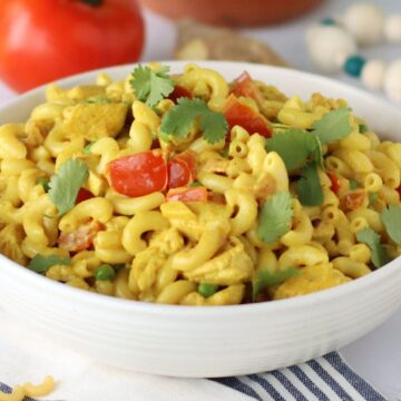 Chicken Curry Pasta Recipe in a white bowl.