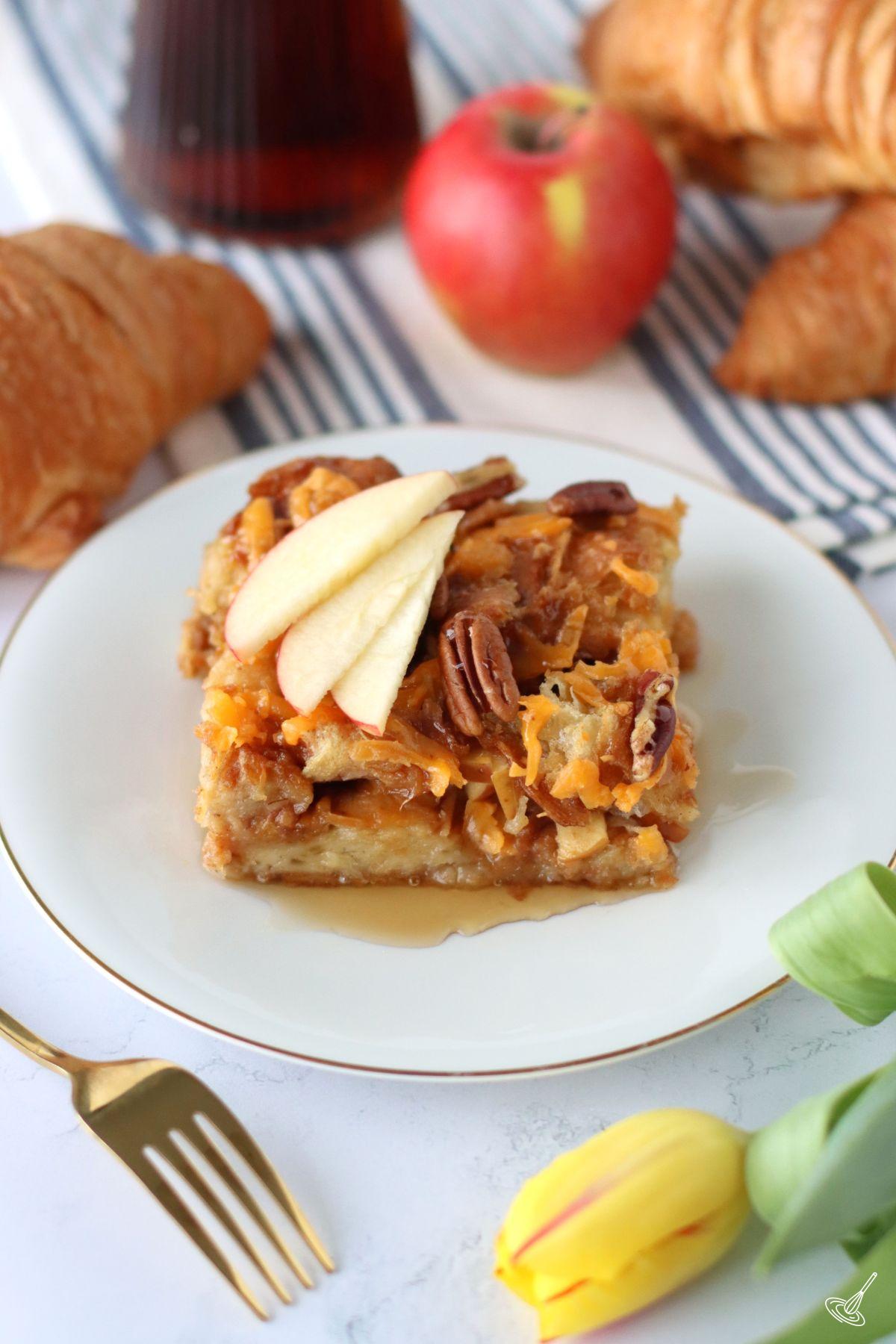 A piece of Maple Croissant Bake on a plate.