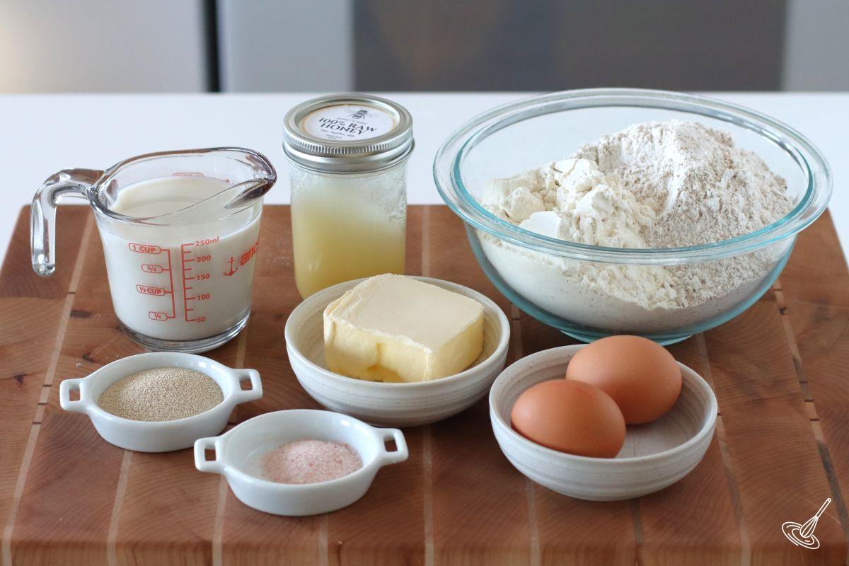 Portioned ingredient on the kitchen counter to make Honey whole wheat dinner rolls.