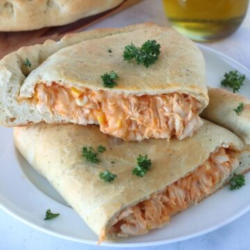 Buffalo Turkey Calzone on a plate.