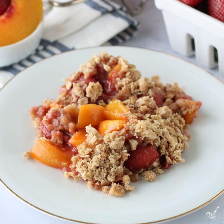 Strawberry Peach Crisp on a plate.