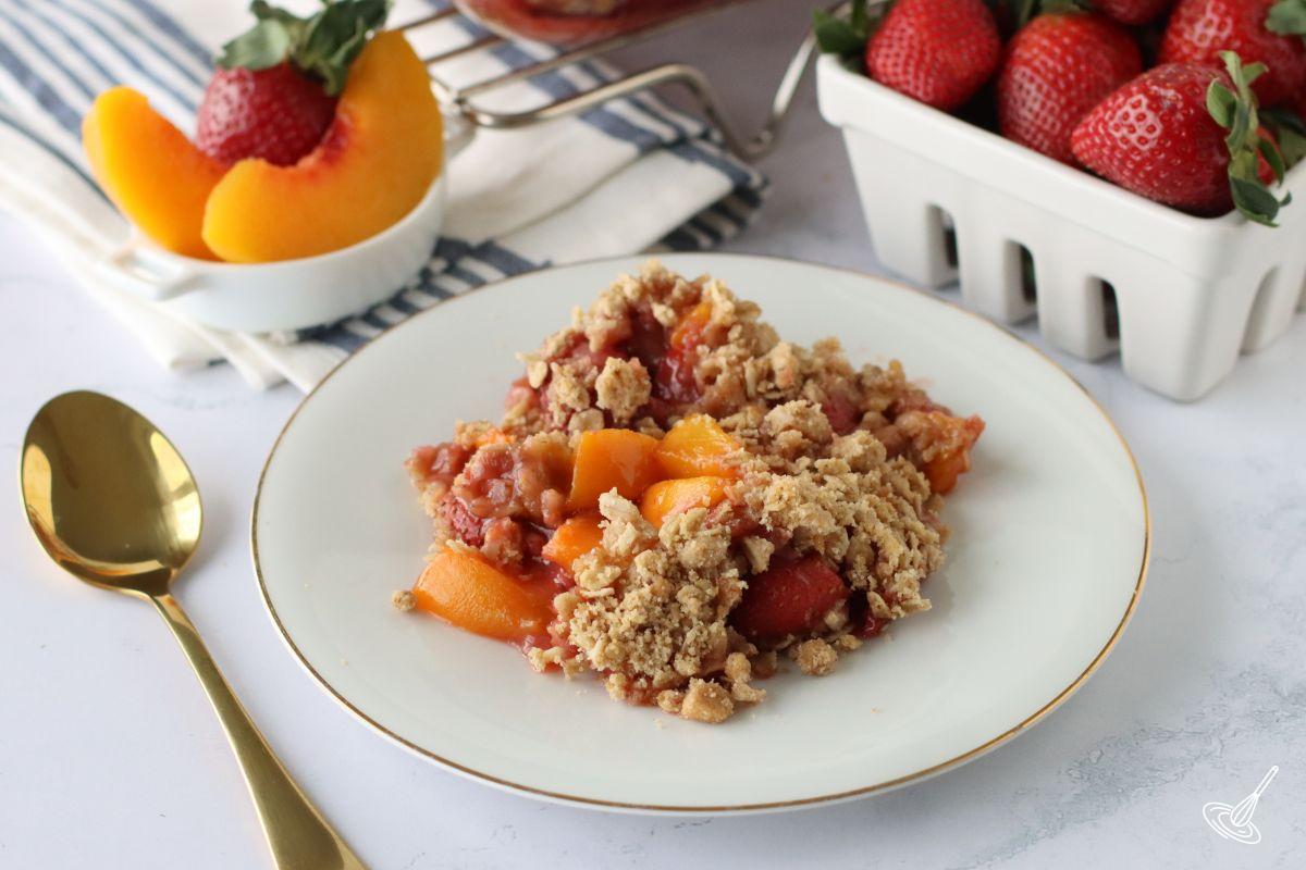 Strawberry Peach Crisp on a plate.