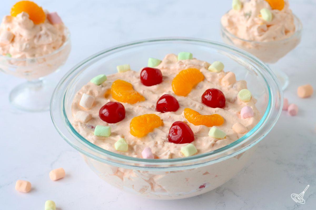 Orange Jello Cottage Cheese Salad in a bowl.