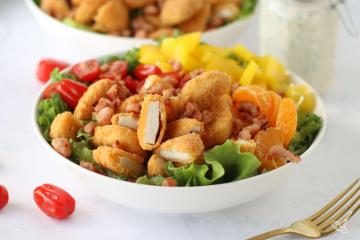 BLT Crispy Chicken Salad in a white bowl.