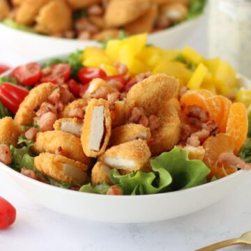 BLT Crispy Chicken Salad in a white bowl.