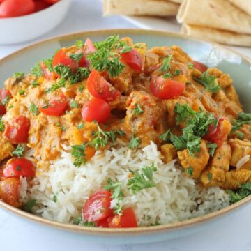 Chicken Curry with Buttermilk in a bowl over rice.