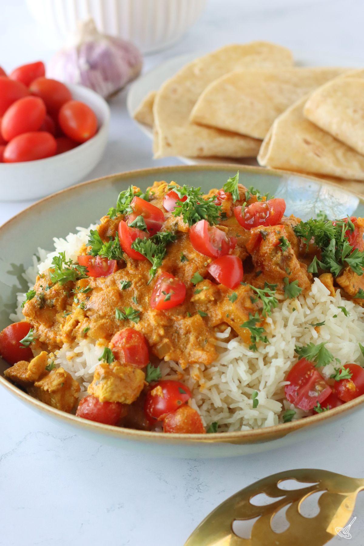 Chicken Curry with Buttermilk over rice in a bowl. 