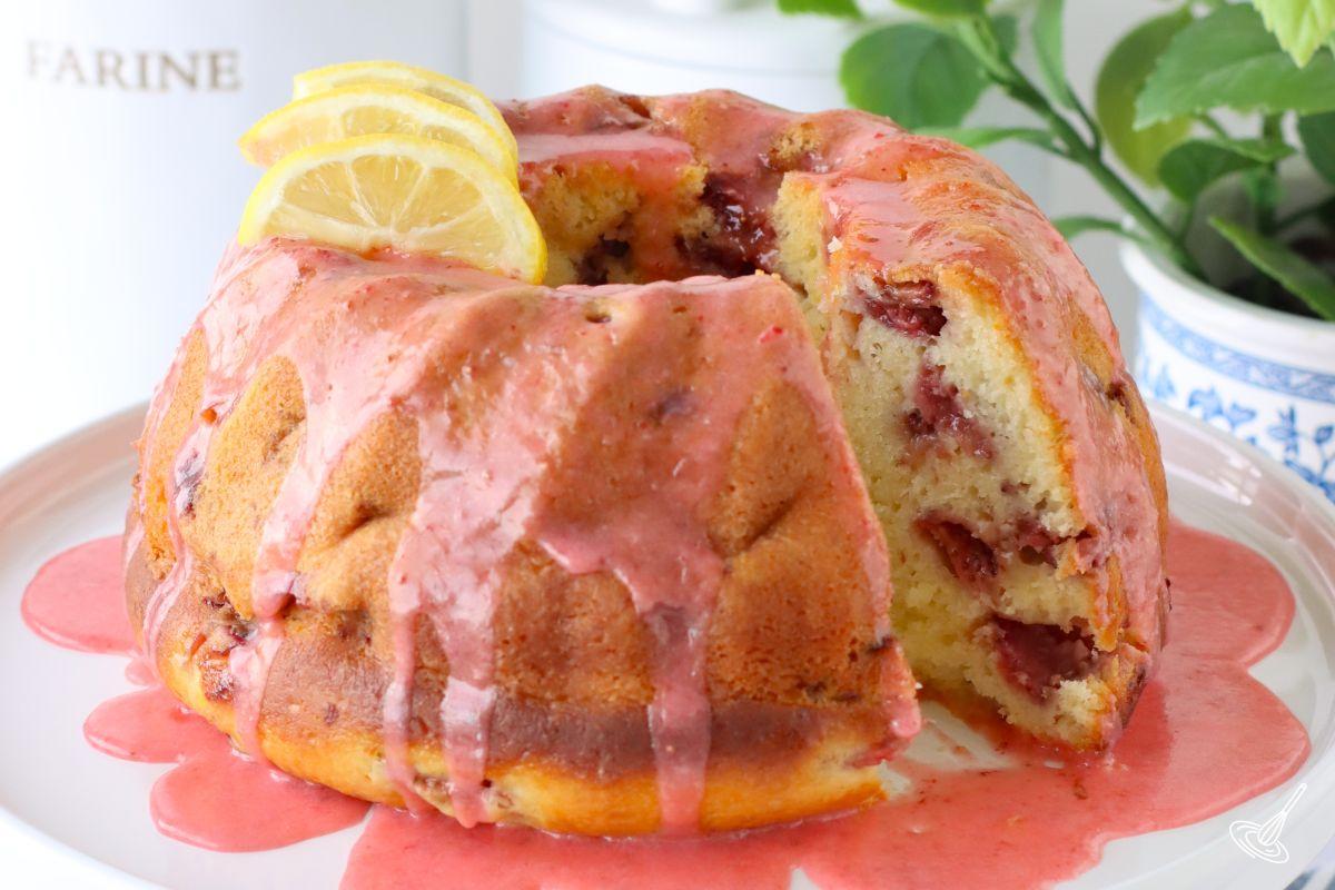 Strawberry Lemonade Bundt Cake on a cake stand.