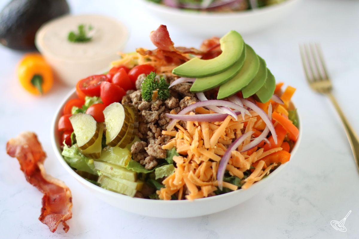 A Turkey Burger Salad in a bowl.