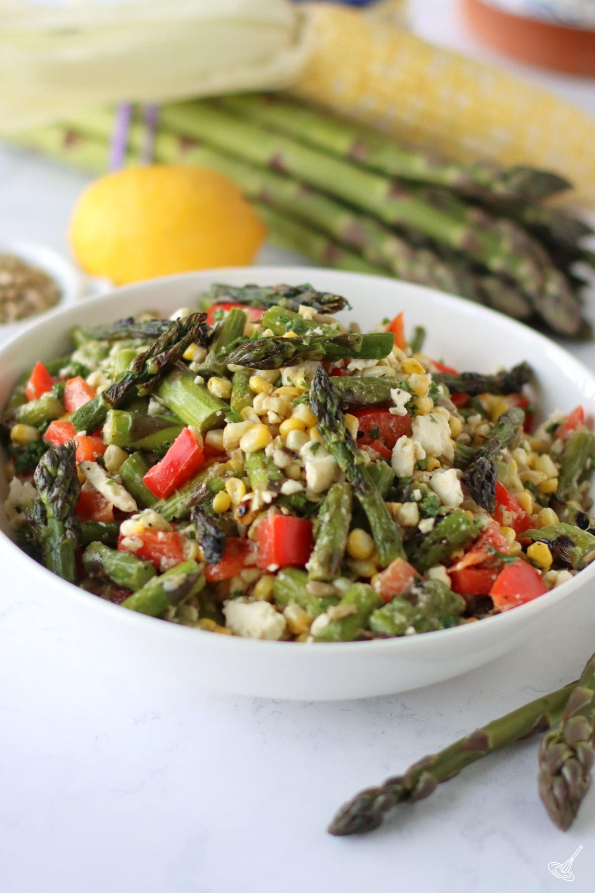 Roasted Corn and Asparagus Salad in a serving bowl. 