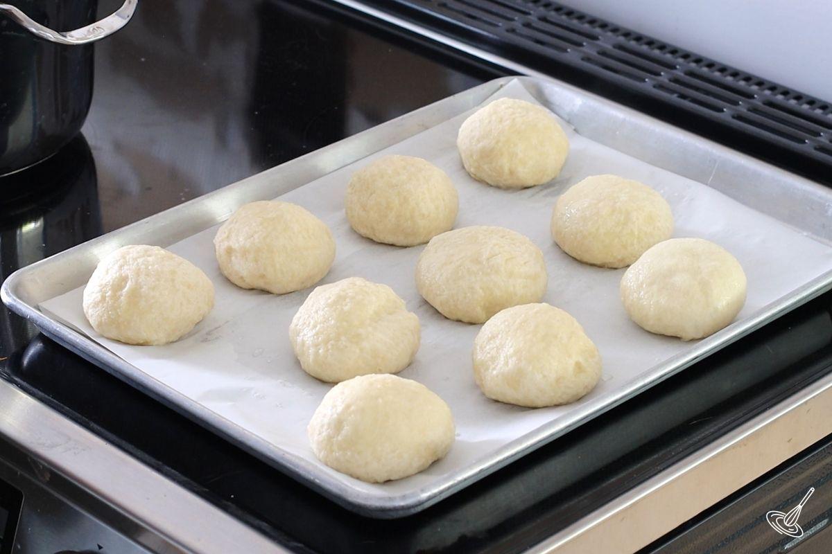 A tray of steamed balls of pretzel dough.