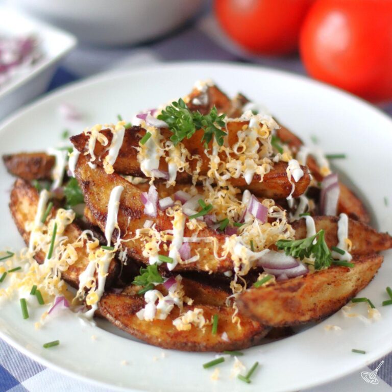 Loaded Potato Wedges on a plate.