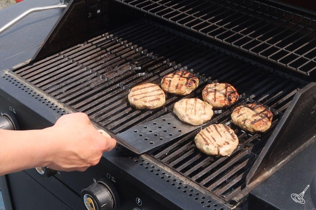Turkey Burger sliders recipe cooking on a BBQ grill.