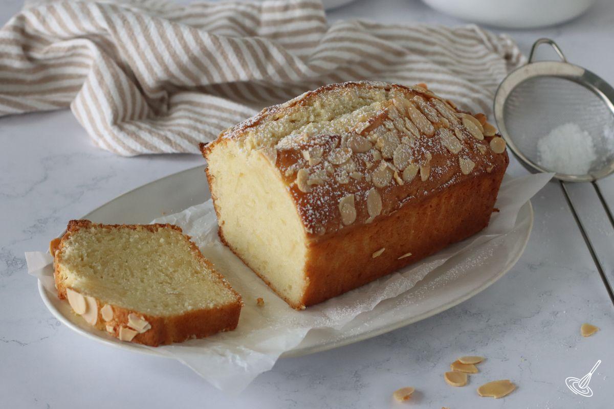 A sliced Almond Pound Cake on a plate.