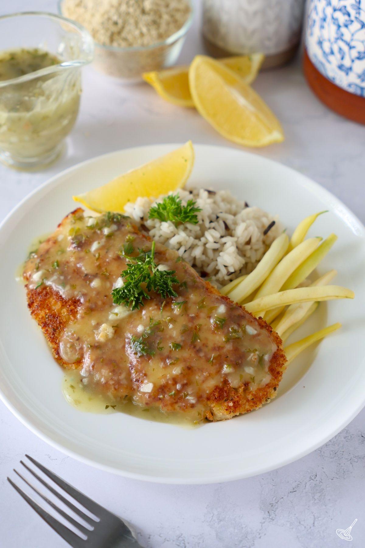 Crispy Lemon Chicken Cutlets on a plate.