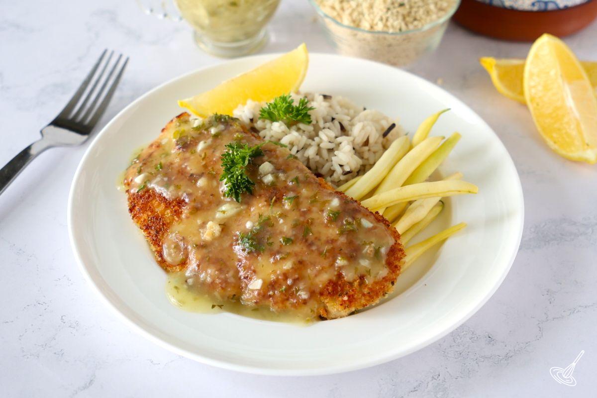 Crispy Lemon Chicken Cutlets on a plate.