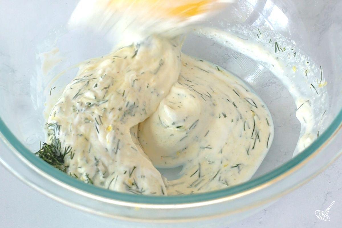 A dill mayo mixture in a bowl.