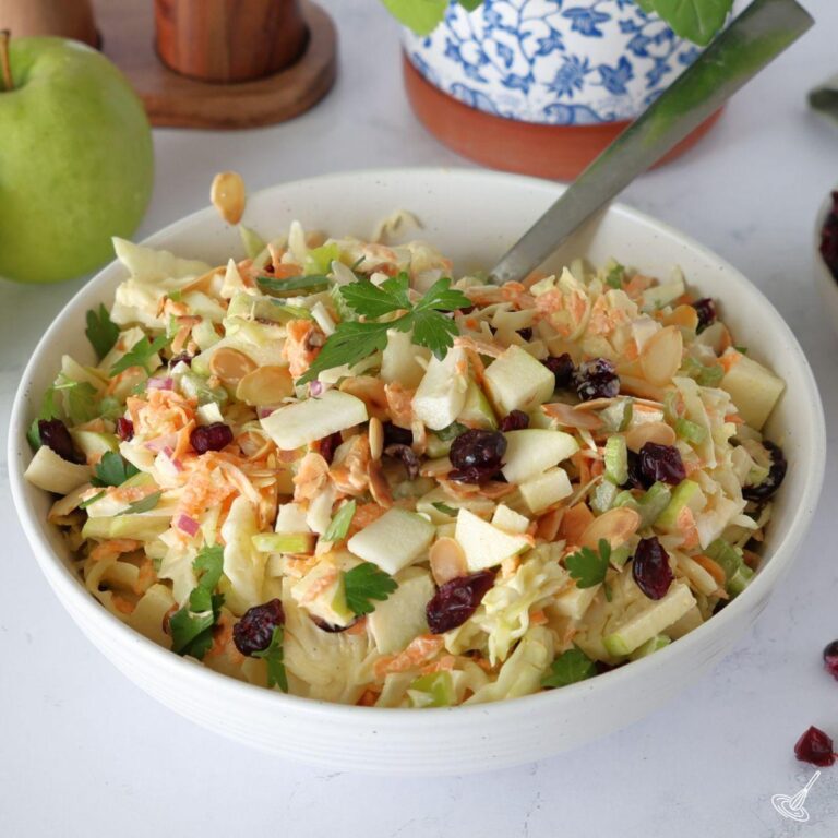 Apple Cranberry Coleslaw in a serving bowl.
