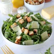 Arugula Caesar Salad in a bowl.