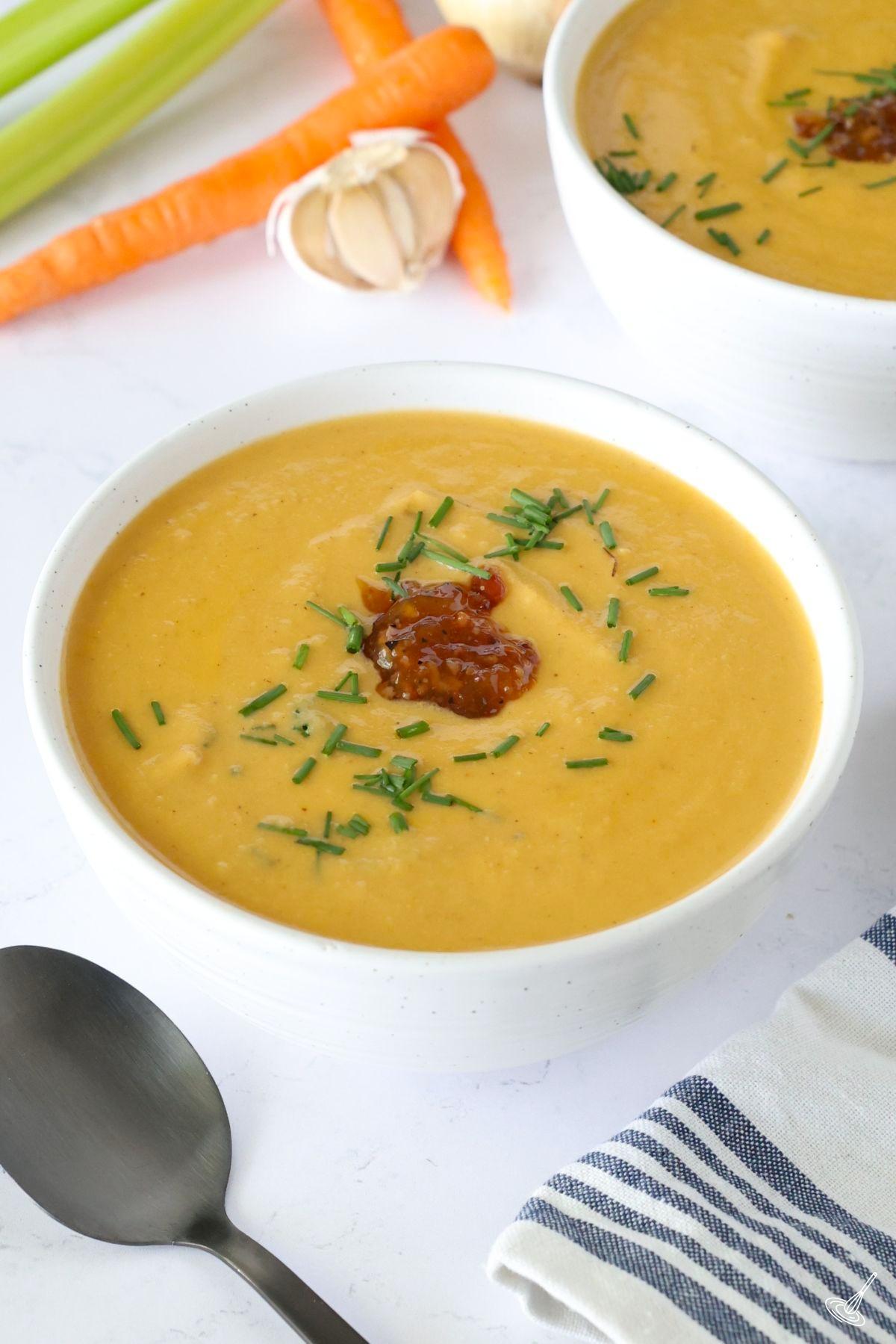 Cauliflower Bisque Soup in a white bowl.