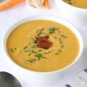 Cauliflower Bisque Soup in a white bowl.