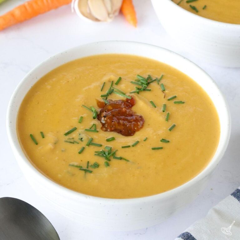 Cauliflower Bisque Soup in a white bowl.