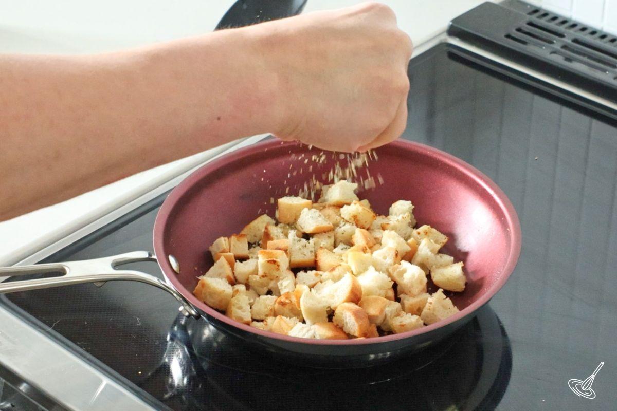 Croutons in a frying pan. 