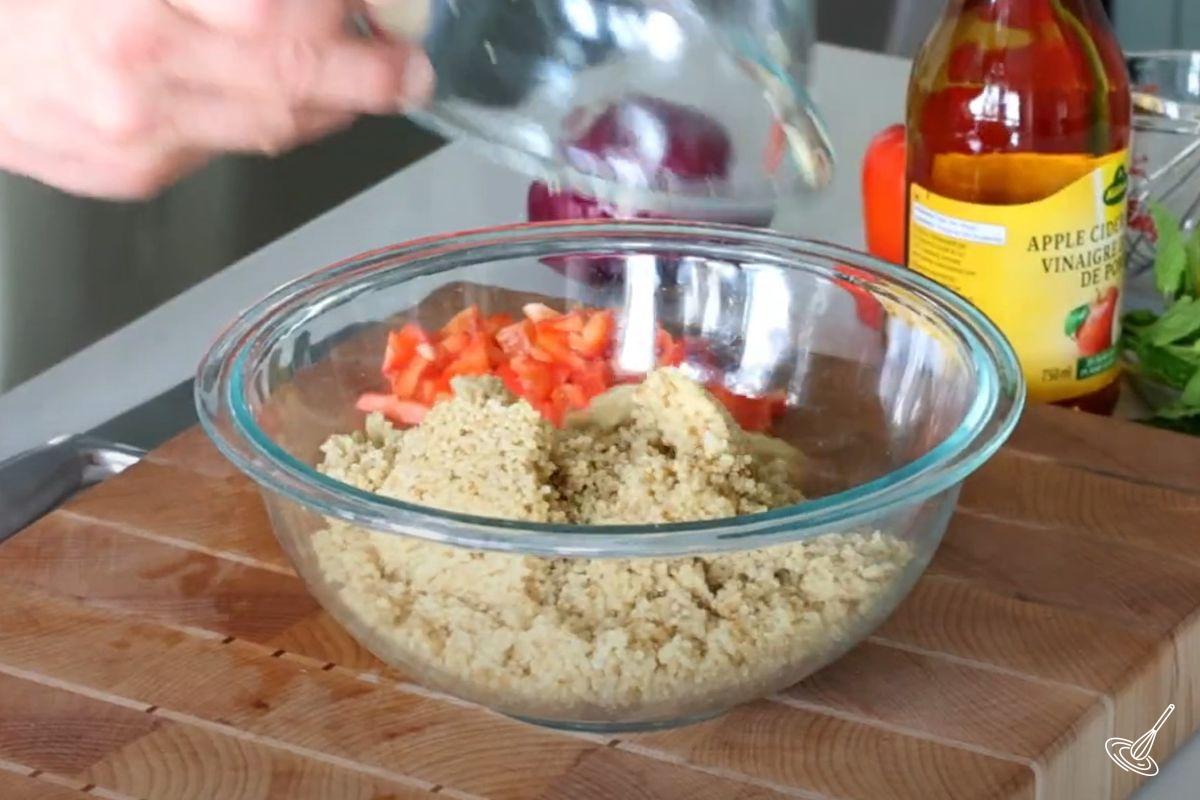Cooked quinoa in a glass bowl. 