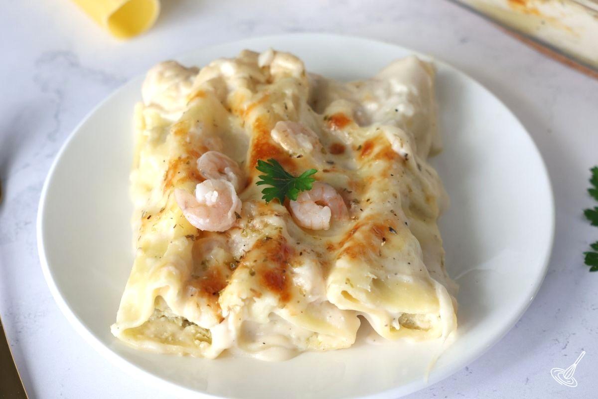Seafood Cannelloni on a white plate.