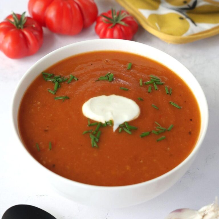 Roasted Tomato and Garlic Soup in a white bowl.