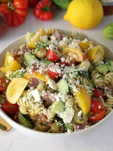 Cucumber Tomato Pasta Salad in a serving bowl.