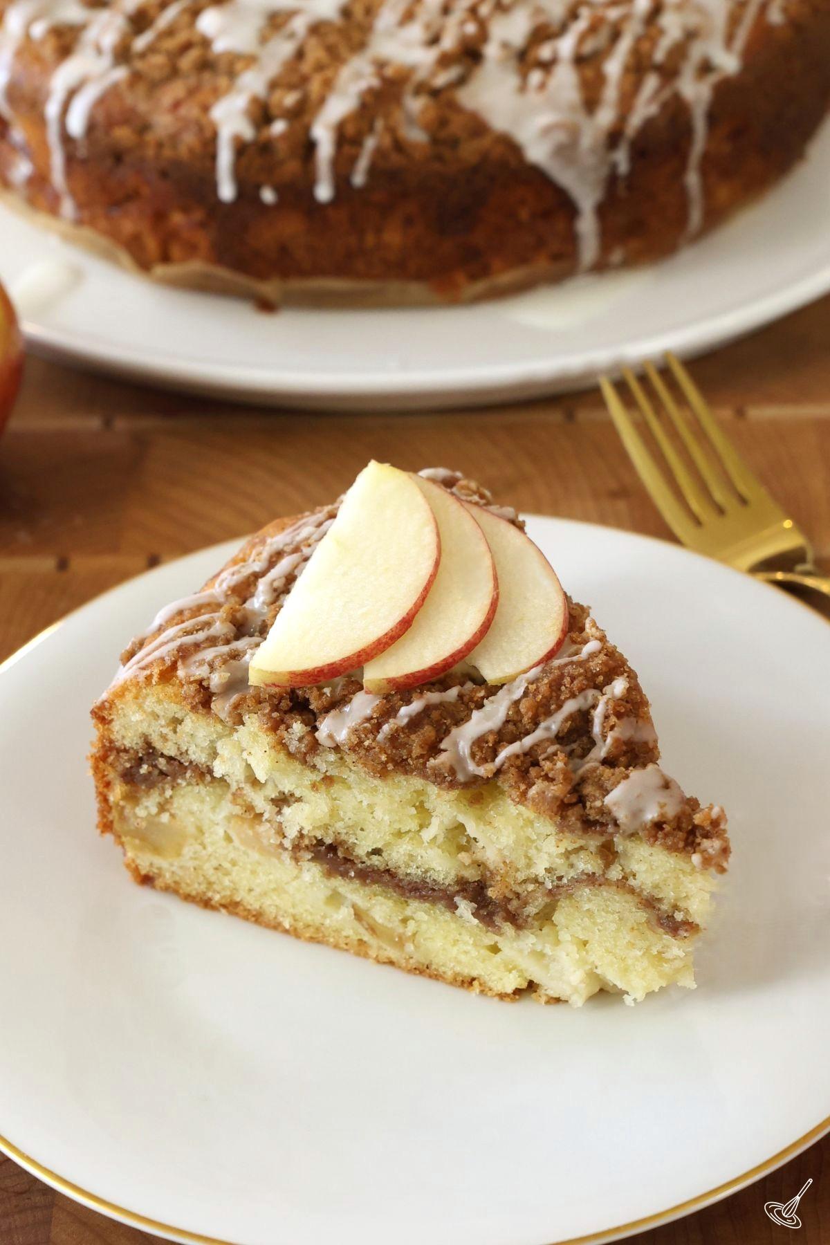 A slice of Apple Coffee Cake on a plate.
