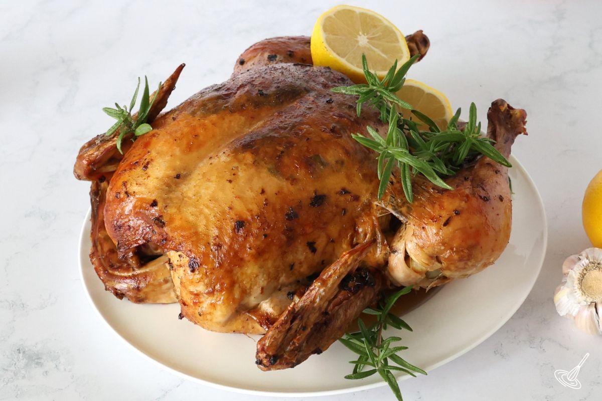 An Italian Roast Chicken on a plate. 