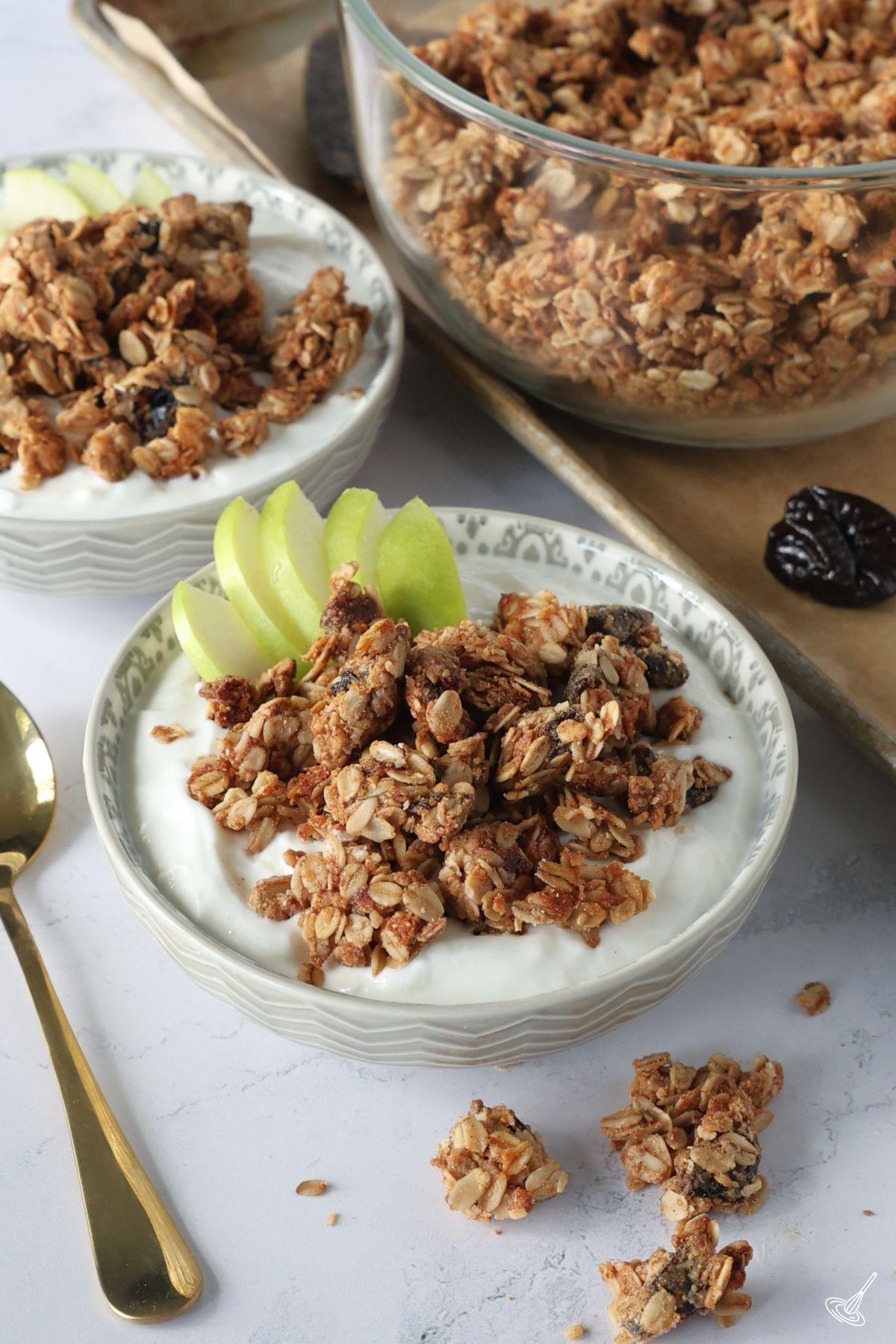 Nut Free Granola served over yogurt in a bowl.