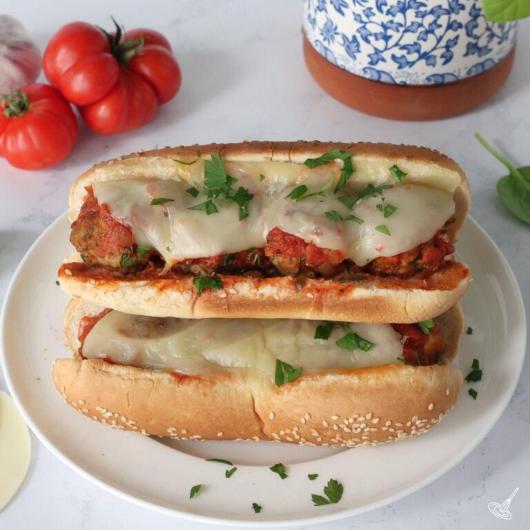 Turkey Florentine Meatball Subs on a plate.