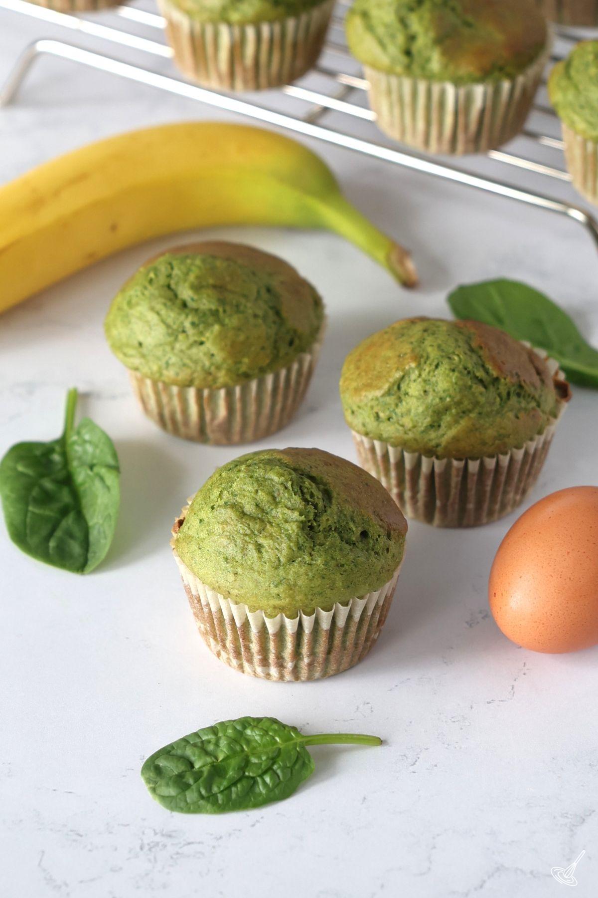 Spinach Banana Muffins on the kitchen counter.