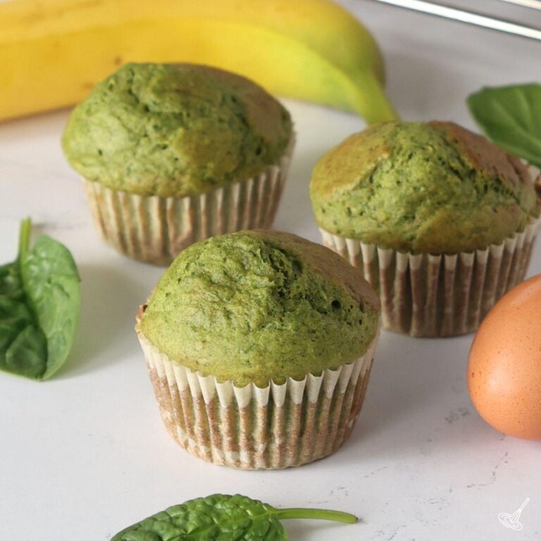 Spinach Banana Muffins on the kitchen counter.
