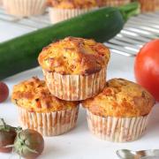 Tomato Zucchini Muffins stacked.